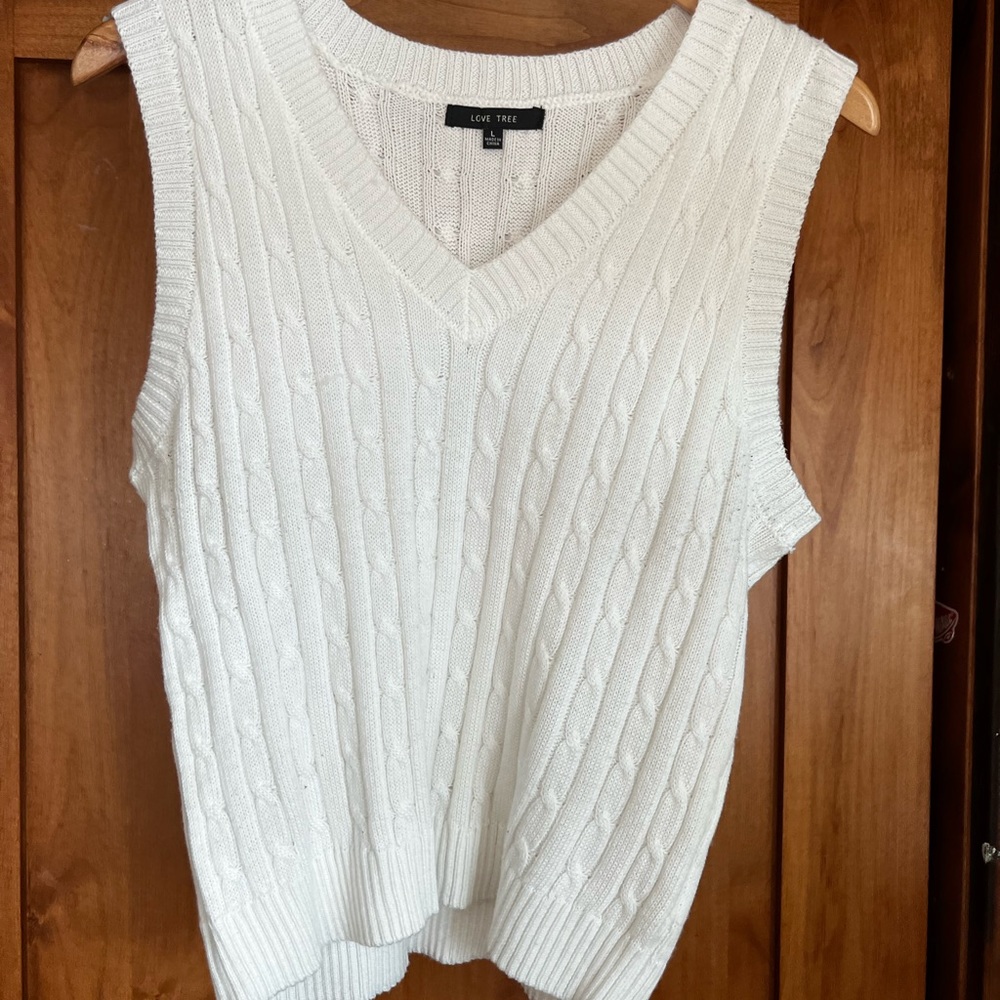 White sweater vest